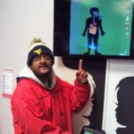 A man wearing a red jacket.
