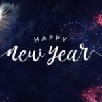 A happy new year with fireworks and the words happy new year.